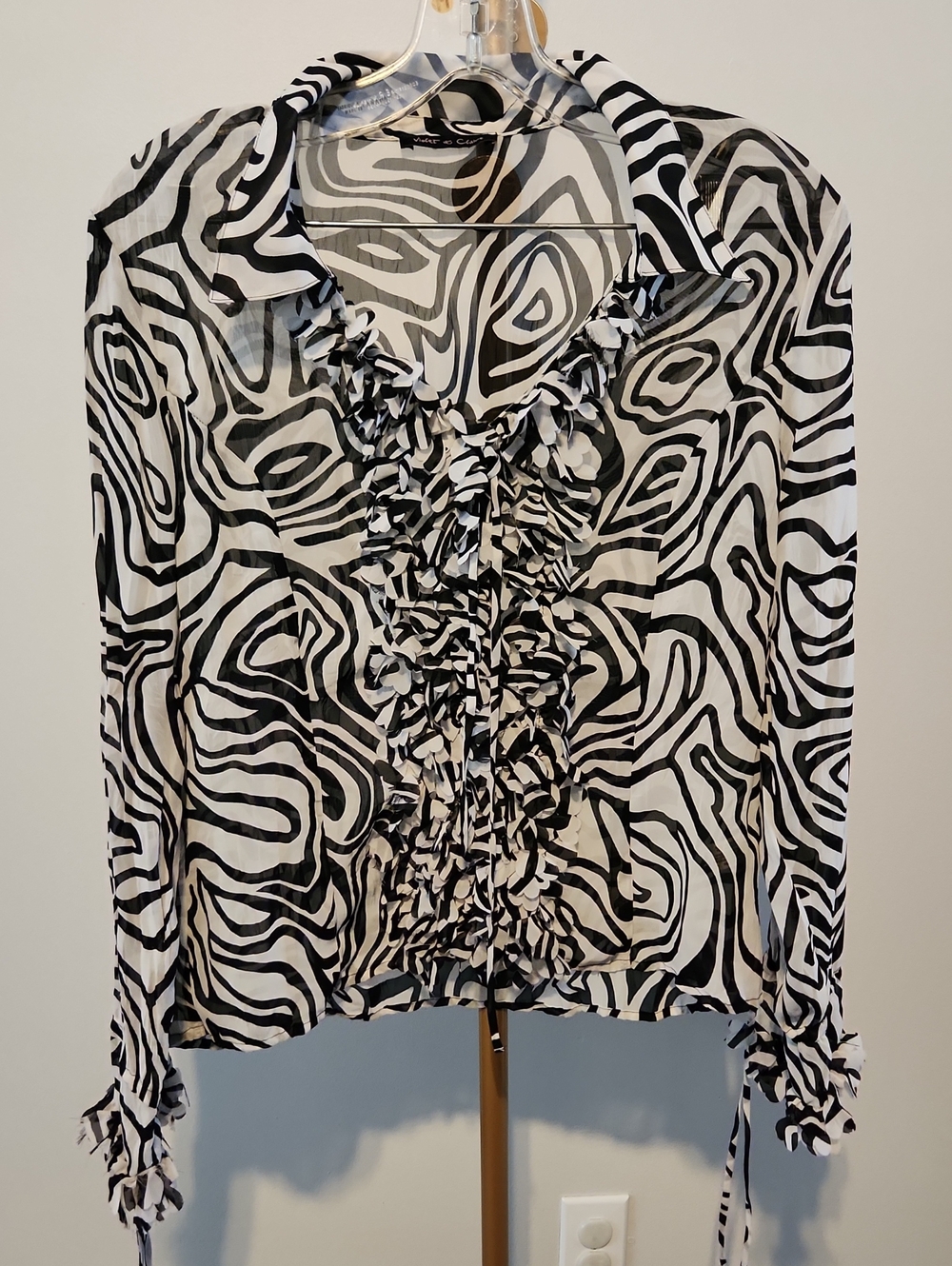Violet & Claire Black and White Ruffle-Front Zebra Print Blouse